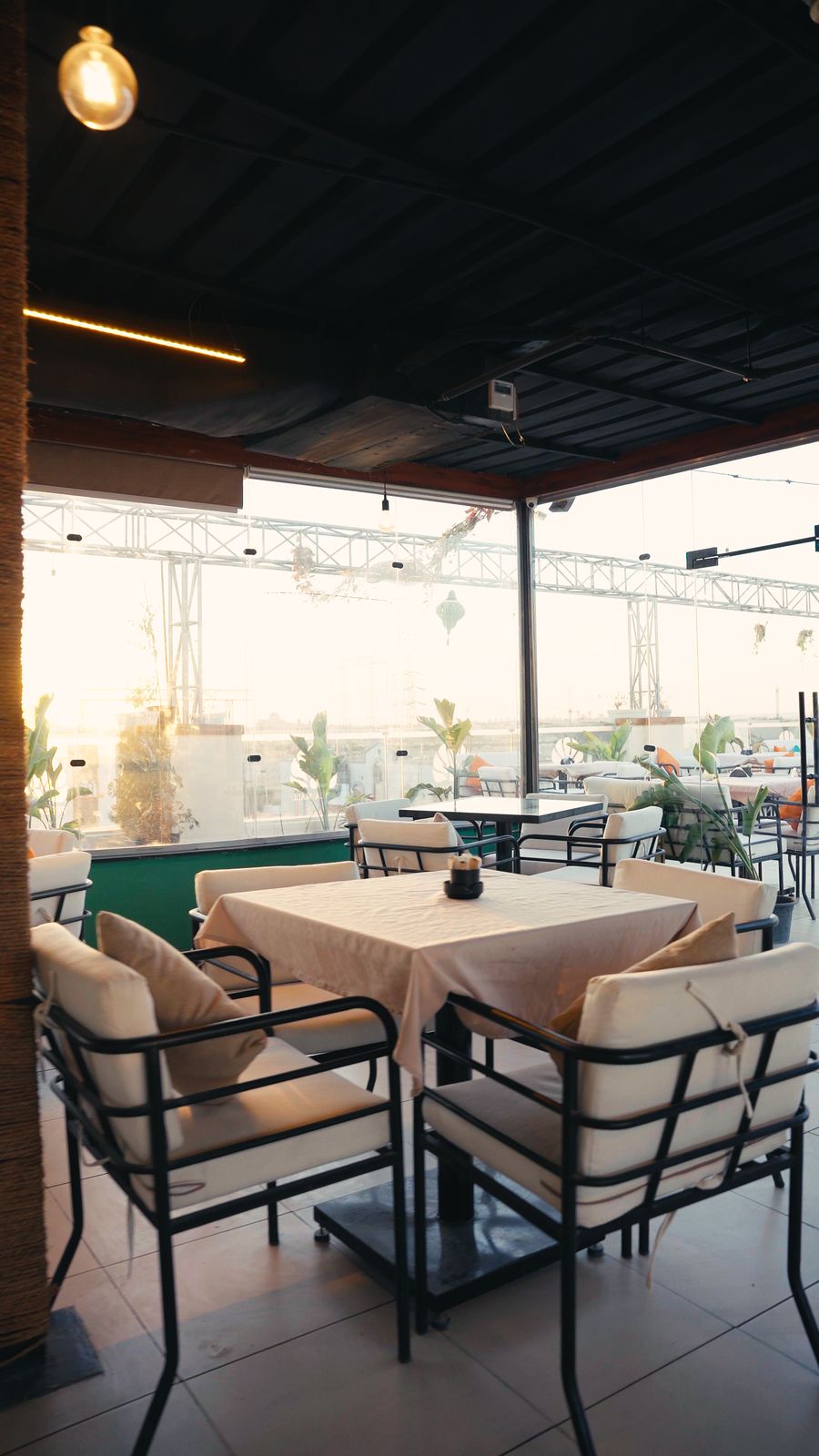 Tables set against the open skyline view
